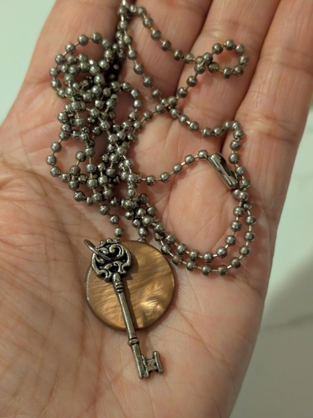 Skeleton Key Victorian-Style with a Circle Brown Resin Pendant Necklace.